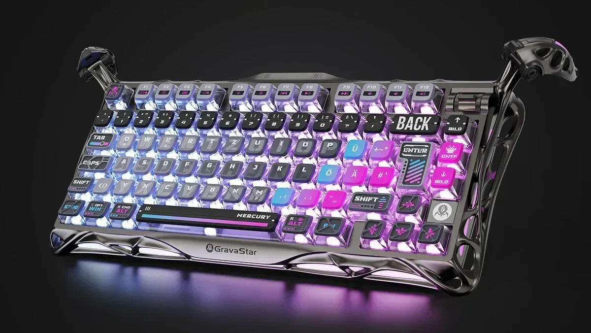 Vergleich von US-ANSI und UK-ISO Tastenbelegung auf einer beleuchteten GravaStar Gaming-Tastatur im englischen Layout